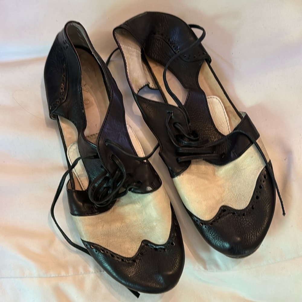 Marseil black and white Mary Jane lace up flats with cut out sides